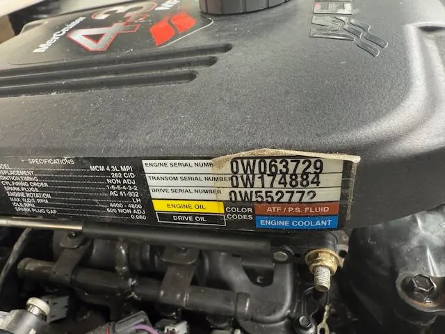 Slide: The Image of Engine details of a 2005 Sea Ray 200 Sport boat, showing serial numbers and specifications. - 19