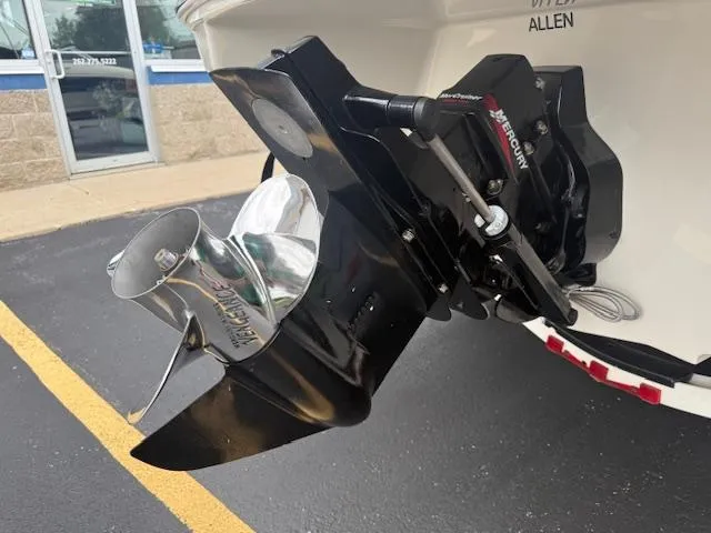 Slide: The Image of Rear view of a 2005 Sea Ray 200 Sport boat with a MerCruiser outdrive. - 21