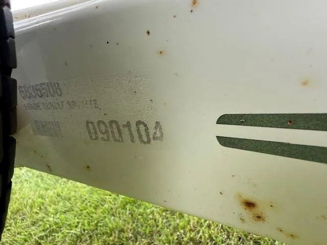 Slide: The Image of Close-up of a 2005 Sea Ray 200 Sport boat hull with visible rust spots. - 25
