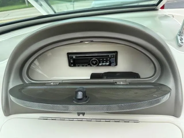 Slide: The Image of Dashboard of a 2005 Sea Ray 200 Sport boat with stereo system. - 8
