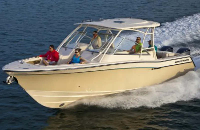 The Image of Manufacturer Provided Image: 2014 Grady-White Freedom 335 boat cruising with passengers on open water. - 0