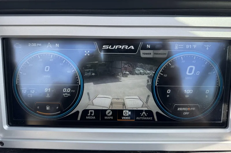 Slide: The Image of 2020 Supra SE 450 dashboard display showing speed, RPM, and rear camera view. - 12