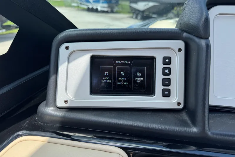 Slide: The Image of Control panel of a 2020 Supra SE 450 boat with touchscreen interface. - 9