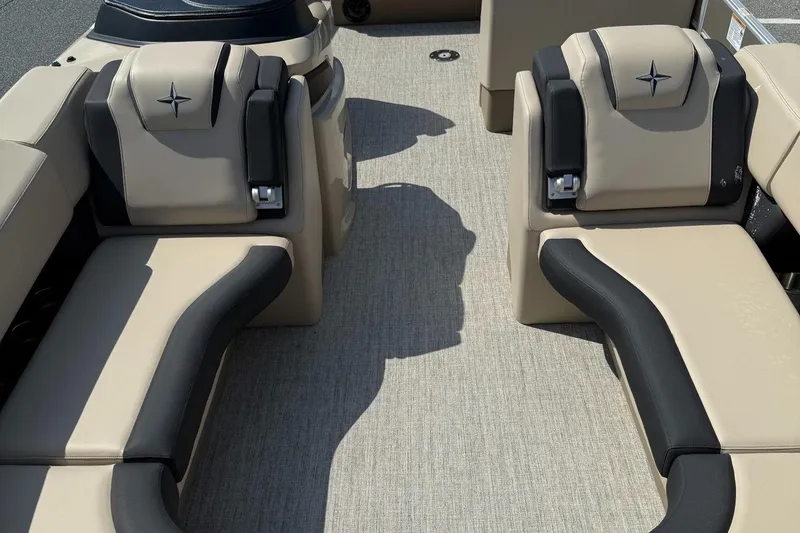 Slide: The Image of 2025 Berkshire 23CL STS 3.0 boat interior with beige and black seating. - 9