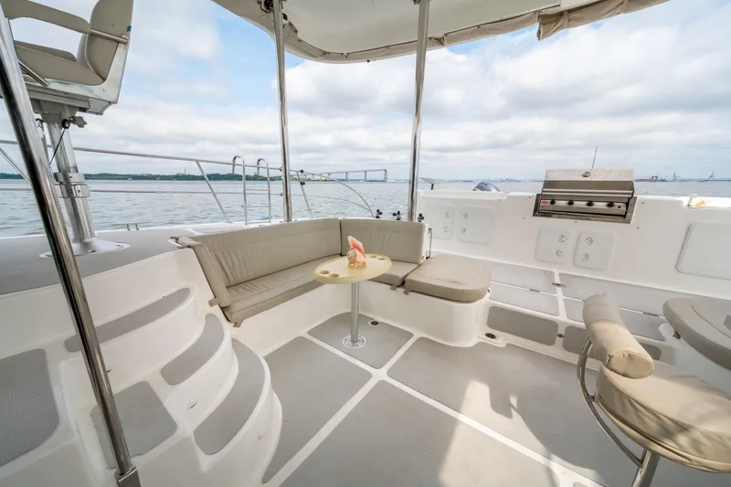 Slide: The Image of Luxurious 2019 Royal Cape Catamarans Majestic 530 deck with seating and ocean view. - 10