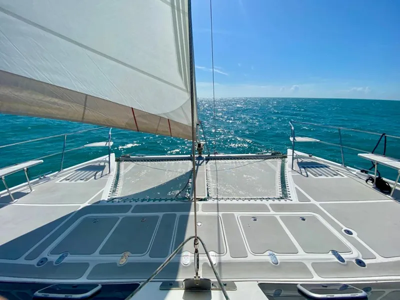 Slide: The Image of Royal Cape Catamarans 530 sailing on open sea, 2019 model, sunny day. - 19