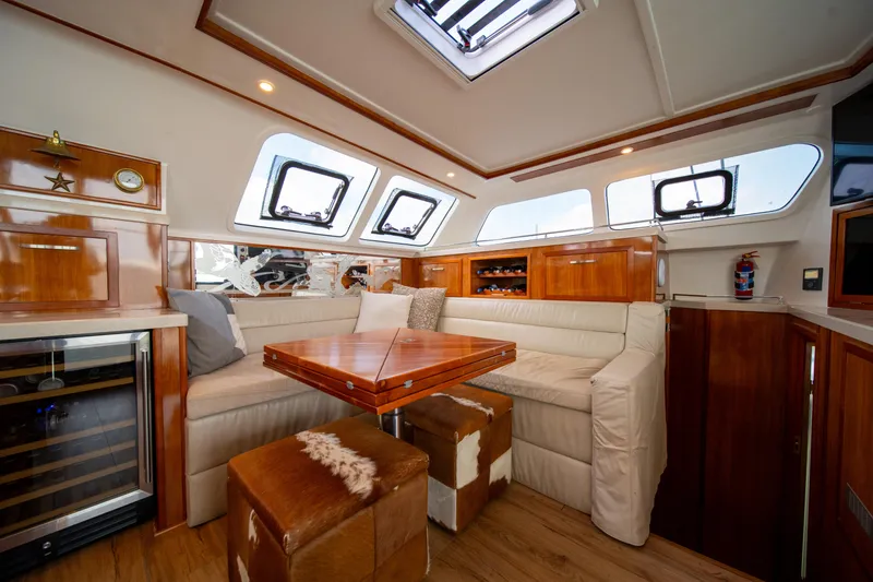 Slide: The Image of Luxurious interior of 2019 Royal Cape Catamarans Majestic 530 with elegant wood finishes. - 29
