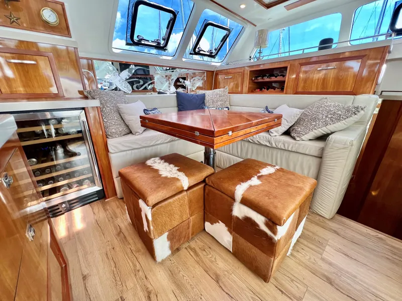 Slide: The Image of Luxurious 2019 Royal Cape Catamarans 530 interior with plush seating and elegant wood finishes. - 30