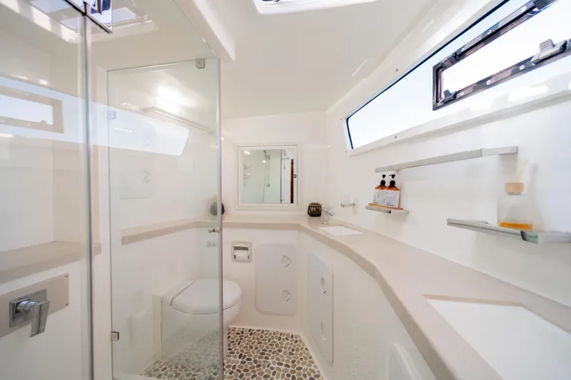Slide: The Image of Luxurious bathroom in 2019 Royal Cape Catamarans Majestic 530, featuring modern fixtures and elegant design. - 38