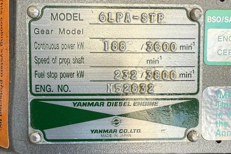 Slide: The Image of Yanmar diesel engine plate, model 6LPA-STP, specifications and serial number visible. - 21