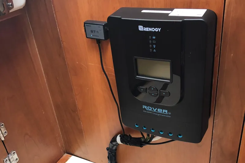 Slide: The Image of Renogy Rover charge controller installed on 2004 Mainship Pilot 30-II Sedan boat. - 25