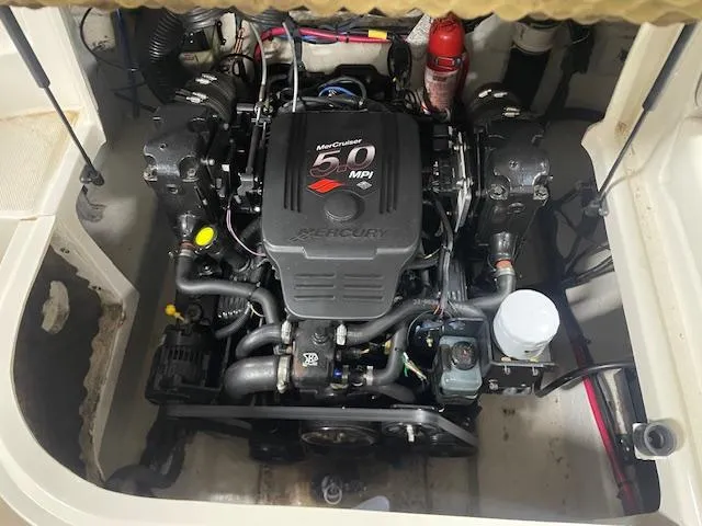 Slide: The Image of Engine compartment of a 2006 Sea Ray 240 Sundeck with MerCruiser 5.0 MPI engine. - 11