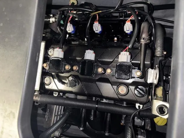 Slide: The Image of 2023 Yamaha WaveRunner VX Cruiser engine, showcasing intricate wiring and components. - 16