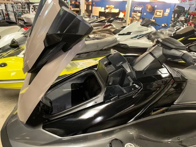 Slide: The Image of 2023 Yamaha WaveRunner VX Cruiser with open storage compartment in a showroom. - 17