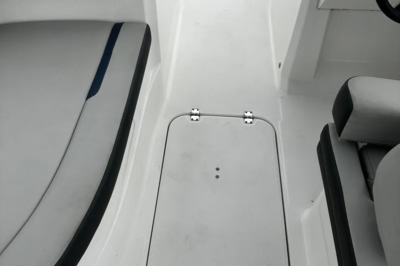 Slide: The Image of Interior view of a 2021 Godfrey Hurricane 205SS boat, featuring seating and deck details. - 11