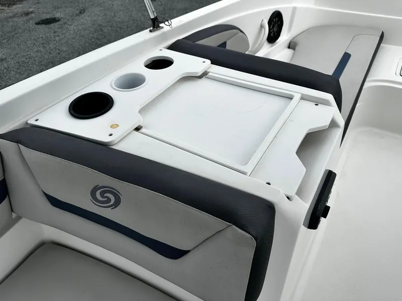 Slide: The Image of Interior of 2021 Godfrey Hurricane 205SS boat with cup holders and seating. - 7