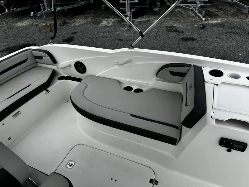 Slide: The Image of Interior of a 2021 Godfrey Hurricane 205SS boat with seating and cup holders. - 8