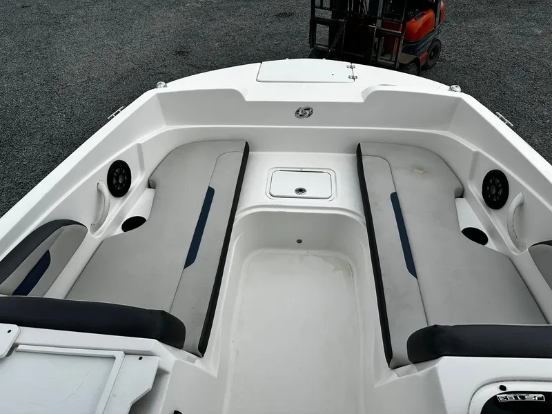 Slide: The Image of 2021 Godfrey Hurricane 205SS boat interior with seating and storage compartments. - 9