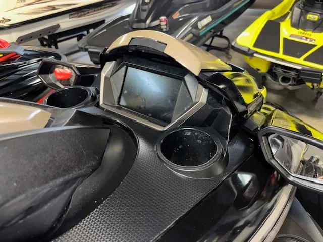 Slide: The Image of 2023 Yamaha WaveRunner FX Cruiser SVHO dashboard with digital display and cup holders. - 11