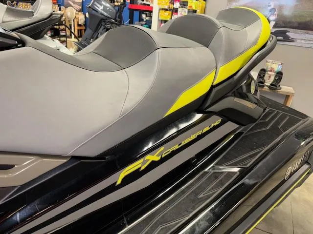 Slide: The Image of 2023 Yamaha WaveRunner FX Cruiser SVHO with sleek gray and yellow seating. - 5