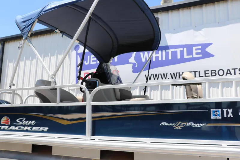 Slide: The Image of 2021 Sun Tracker Bass Buggy 16 XL pontoon boat with canopy, displayed at Whittle Boats. - 11