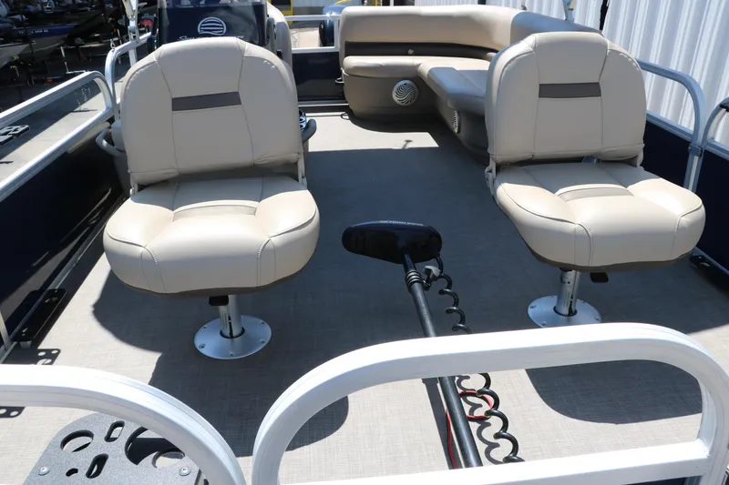 Slide: The Image of 2021 Sun Tracker Bass Buggy 16 XL pontoon boat interior with beige seating. - 20