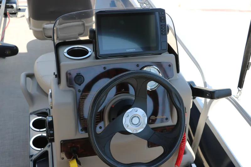 Slide: The Image of 2021 Sun Tracker Bass Buggy 16 XL steering console with Garmin display. - 24