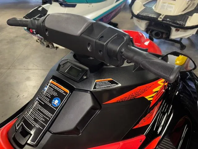 Slide: The Image of 2021 Yamaha WaveRunner EX Sport handlebars and dashboard, featuring vibrant red and black design. - 11