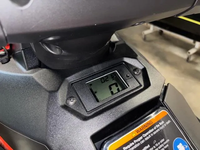 Slide: The Image of 2021 Yamaha WaveRunner EX Sport dashboard with digital display and warning label. - 12