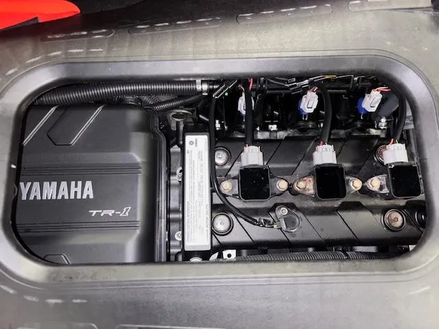 Slide: The Image of Engine compartment of 2021 Yamaha WaveRunner EX Sport, showcasing TR-1 engine components. - 15
