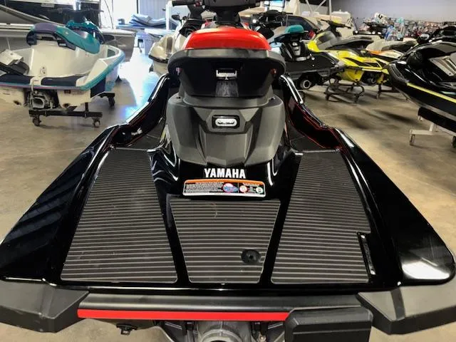 Slide: The Image of 2021 Yamaha WaveRunner EX Sport in showroom, rear view, black and red design. - 7