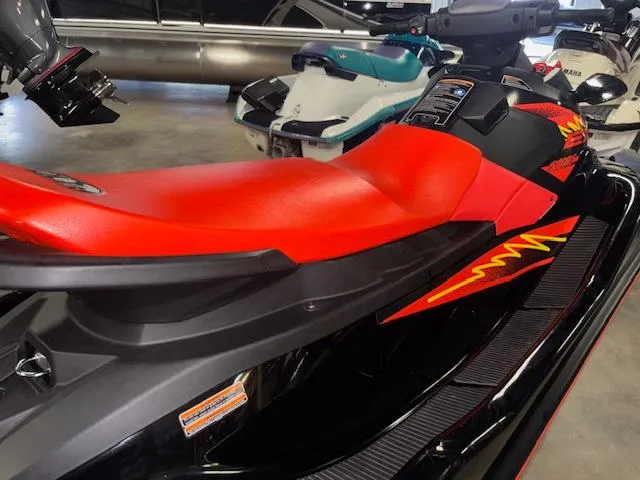 Slide: The Image of 2021 Yamaha WaveRunner EX Sport with vibrant red seat and sleek black design. - 9