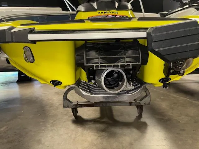 Slide: The Image of 2023 Yamaha WaveRunner EX Sport, rear view, showcasing jet propulsion system. - 13