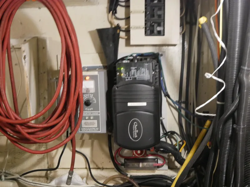 Slide: The Image of Electrical components and wiring inside a 1978 Hatteras 58 Cockpit Motor Yacht. - 8