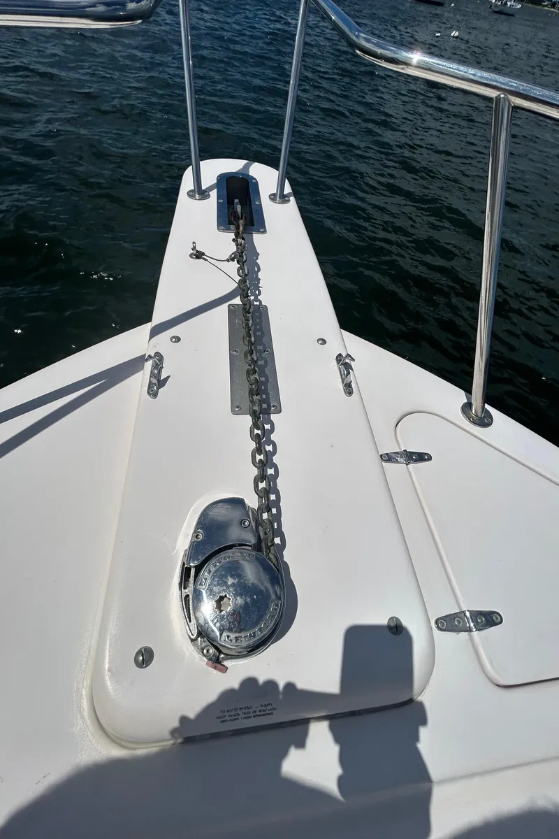 Slide: The Image of Bow of 2007 Grady-White Express 305 with anchor chain and winch. - 43