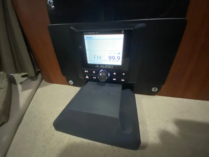 Slide: The Image of JL Audio stereo system in 2004 Chaparral Signature 330 boat cabin. - 25