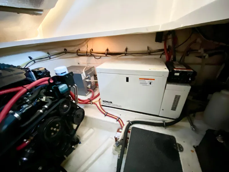 Slide: The Image of Engine room of 2004 Chaparral Signature 330 with Kohler generator and wiring. - 34