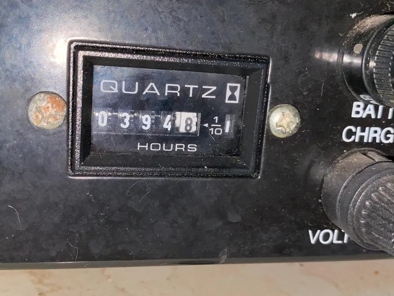 Slide: The Image of Hour meter showing 394.8 hours on 2004 Chaparral Signature 330 boat. - 35