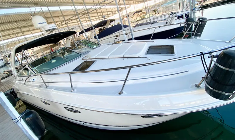 Slide: The Image of 2004 Chaparral Signature 330 boat docked in marina, side view. - 4