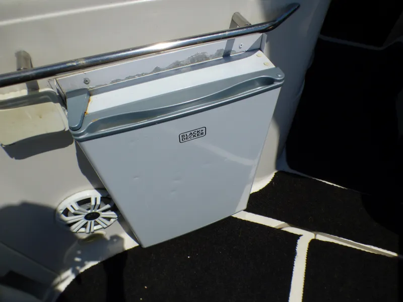 Slide: The Image of Mini fridge on 2001 Monterey 302 Cruiser boat deck, with Black & Decker logo. - 30