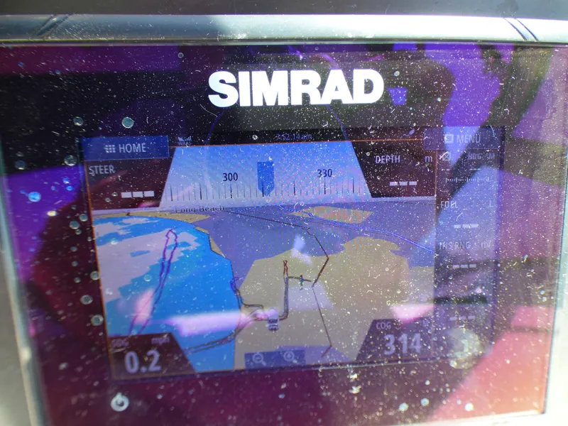 Slide: The Image of Simrad navigation display on 2001 Monterey 302 Cruiser boat. - 33