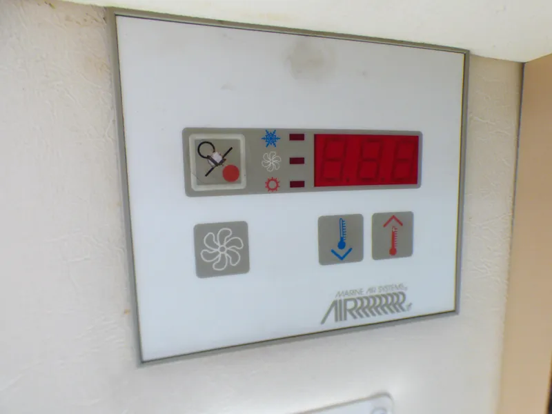Slide: The Image of Control panel of a 2001 Monterey 302 Cruiser's marine air system. - 35