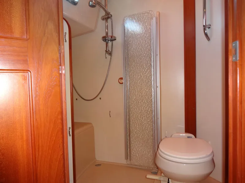 Slide: The Image of Guest Head with large, enclosed shower - 28