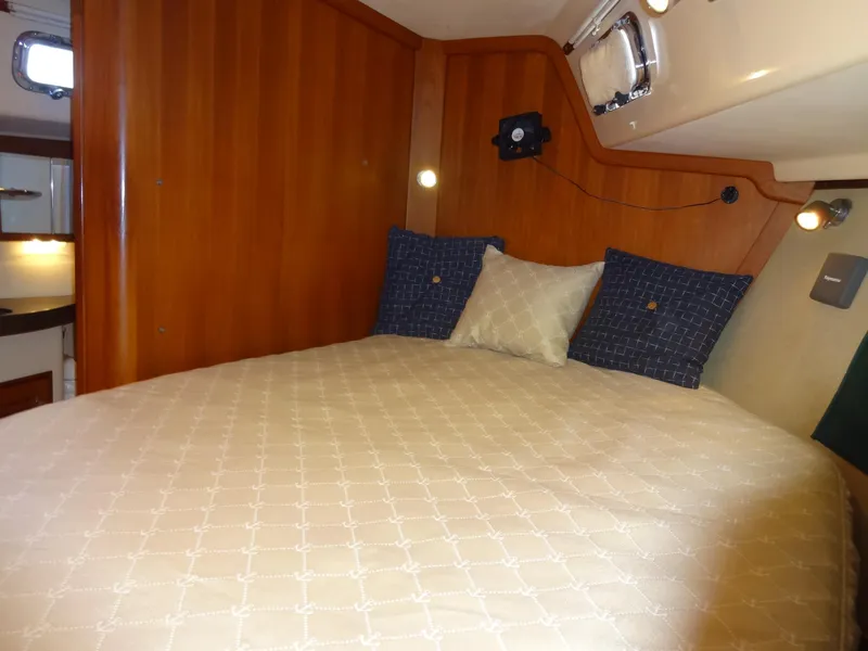 Slide: The Image of Standing starboard side of walk around queen - 46