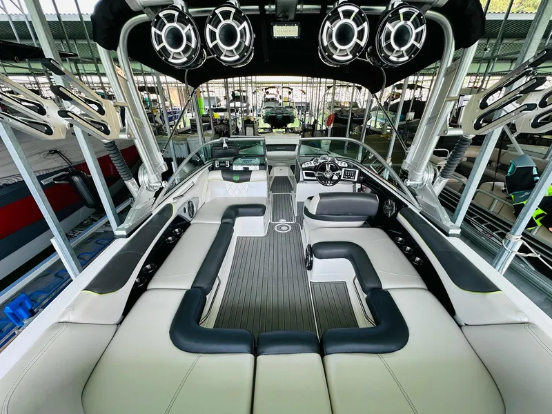 Slide: The Image of 2012 MasterCraft X-45 boat interior with spacious seating and advanced audio system. - 16