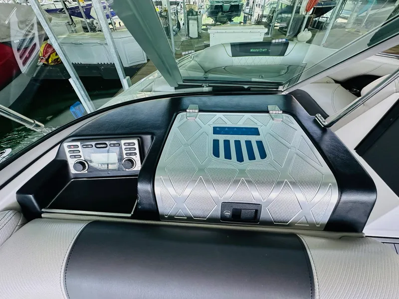 Slide: The Image of 2012 MasterCraft X-45 boat dashboard with control panel and sleek design. - 20