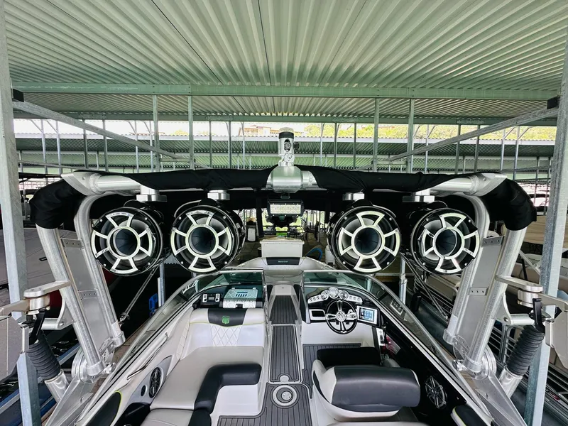Slide: The Image of 2012 MasterCraft X-45 boat interior with advanced sound system and sleek design. - 21