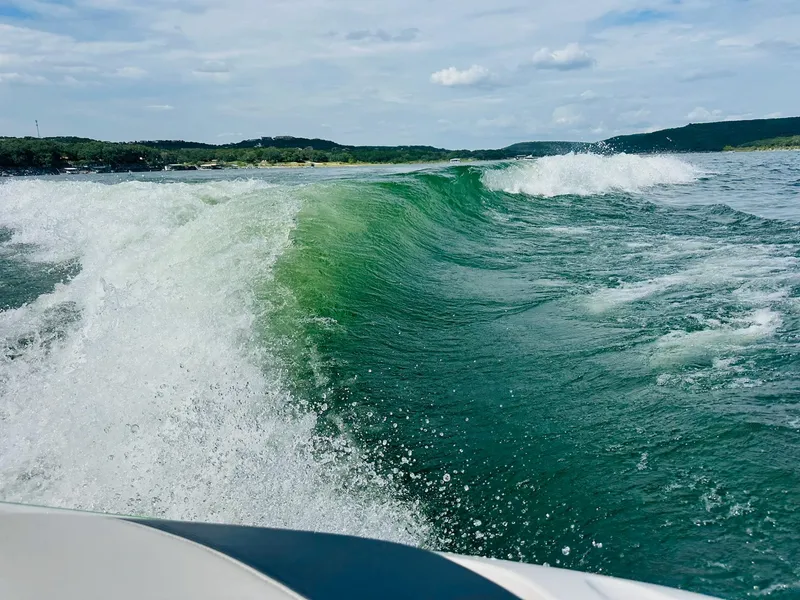 Slide: The Image of Wake created by a 2012 MasterCraft X-45 boat on a scenic lake. - 27