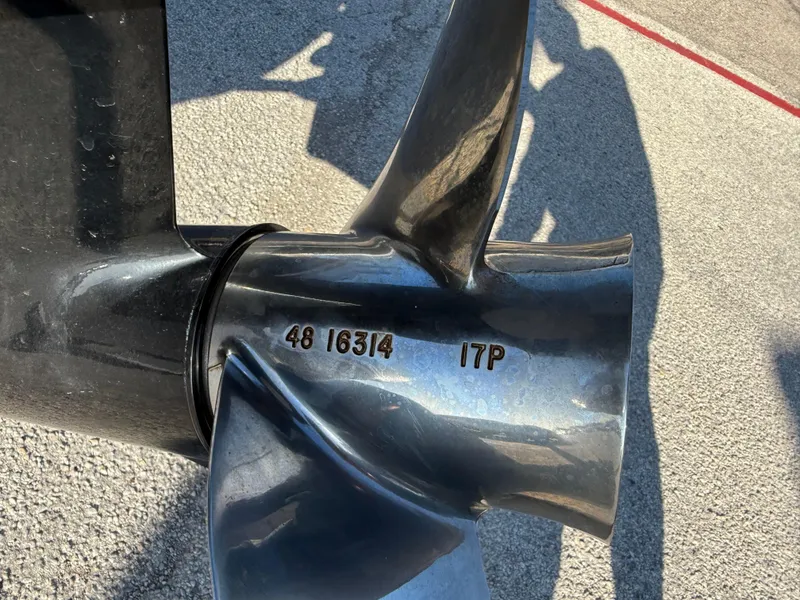 Slide: The Image of Close-up of a 2020 Tahoe 2150 CC boat propeller with engraved numbers. - 10