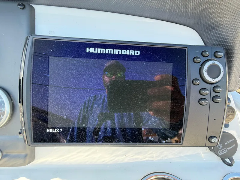 Slide: The Image of Humminbird Helix 7 fish finder on 2020 Tahoe 2150 CC boat dashboard. - 34